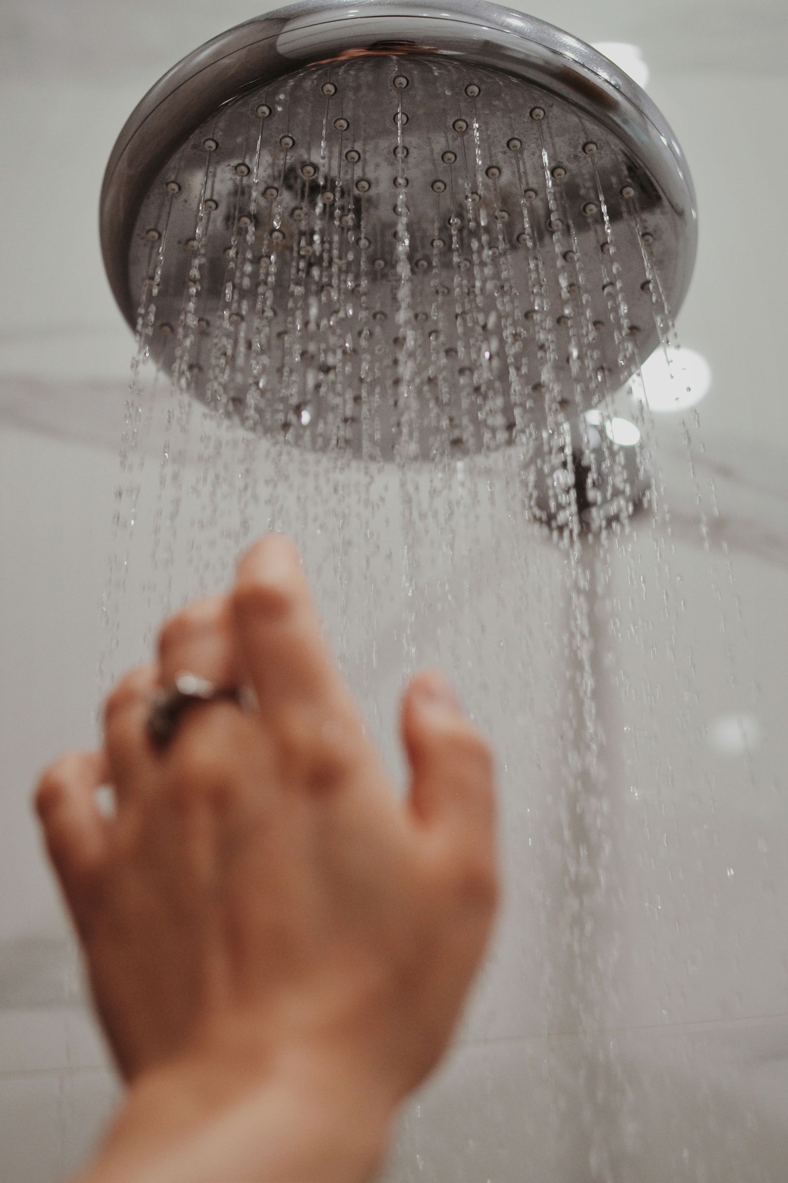 Water flowing from a shower head